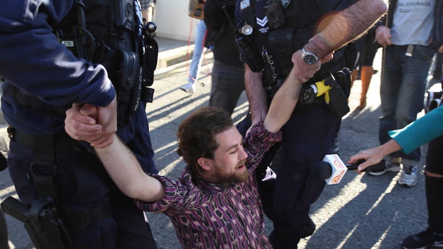 Police arrest protesters in Brisbane's CBD