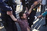 Police arrest protesters in Brisbane's CBD