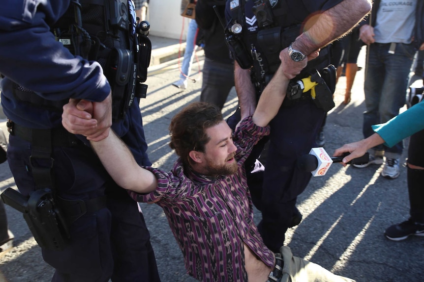 Police arrest protesters in Brisbane's CBD