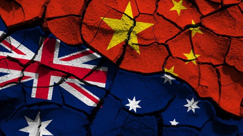 A graphic showing the Australian and Chinese flags colliding as if they were landmasses.