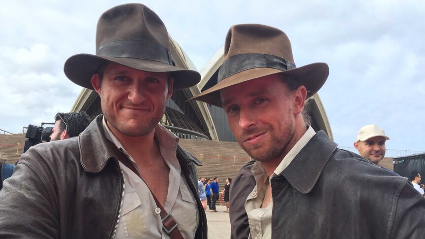 Rod Fletcher and Andrew Scott are dressed as Indiana Jones at a fan event featuring Harrison Ford.