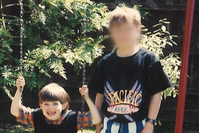 Two boys smiling.