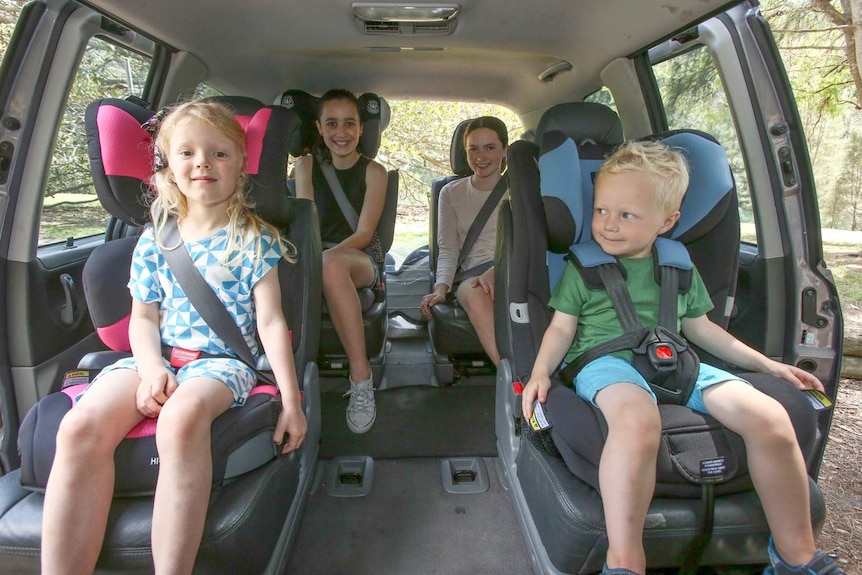 When can my child stop using a booster seat in the car?