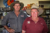 Archer River Roadhouse owners Brad Allan and Hugh Atherton looking at the camera at their roadhouse on the Cape York Peninsula.