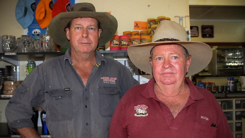 Archer River Roadhouse owners Brad Allan and Hugh Atherton looking at the camera at their roadhouse on the Cape York Peninsula.