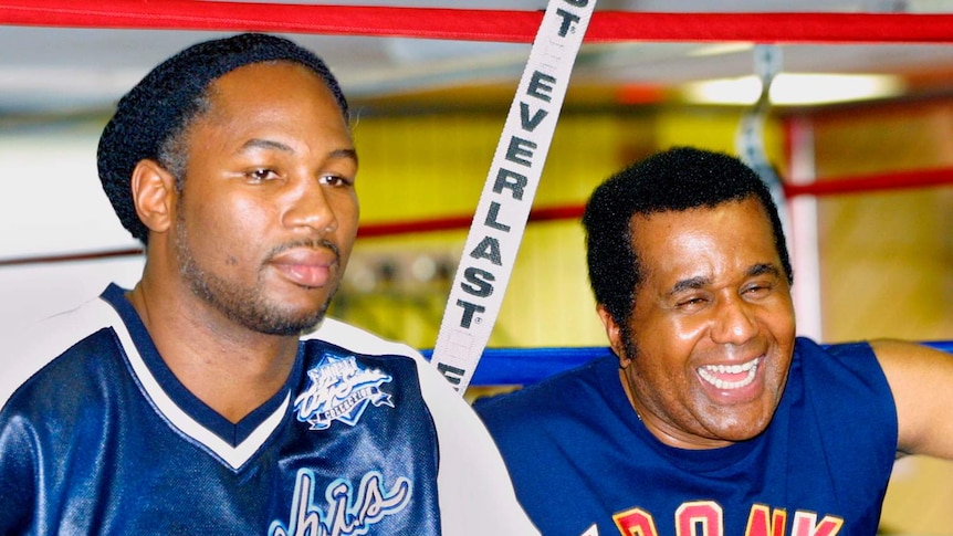 Trainer Emanuel Steward (R) and heavyweight boxing champion Lennox Lewis.