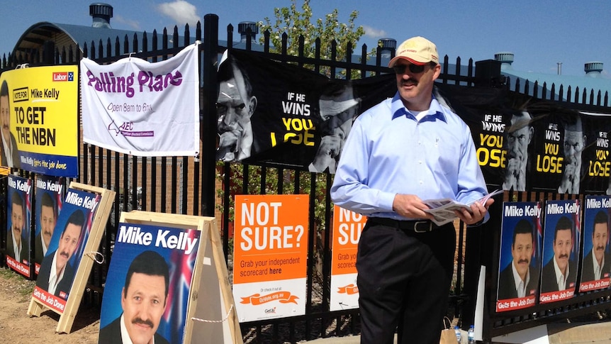 Current Labor member for Eden-Monaro Dr Mike Kelly casting his vote at Karabah High School in Canberra.
