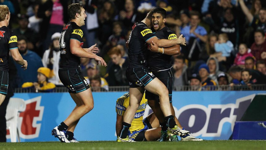 Tyrone Peachey celebrates a try for Penrith against Parramatta in round 12, 2014.