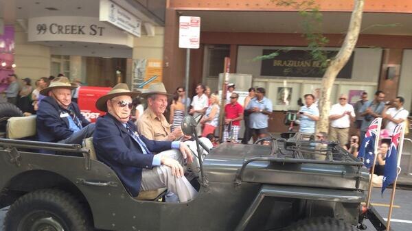 Veterans in a jeep take part in the Anzac Day march in Brisbane on April 25, 2014