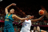 France's Isabelle Yacoubou (R) grabs rebound from Australia's Liz Cambage at London Olympics.
