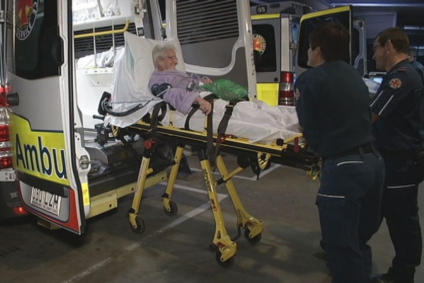 Patient being taken from ambulance at Logan Hospital, south of Brisbane in August 2013