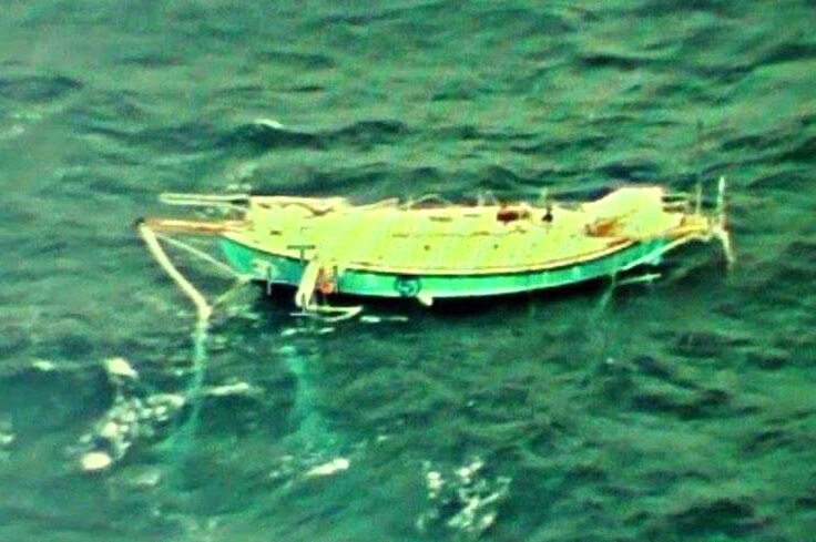 An aerial shot of the stricken 10-metre yacht Thuriya floating in the southern Indian Ocean.