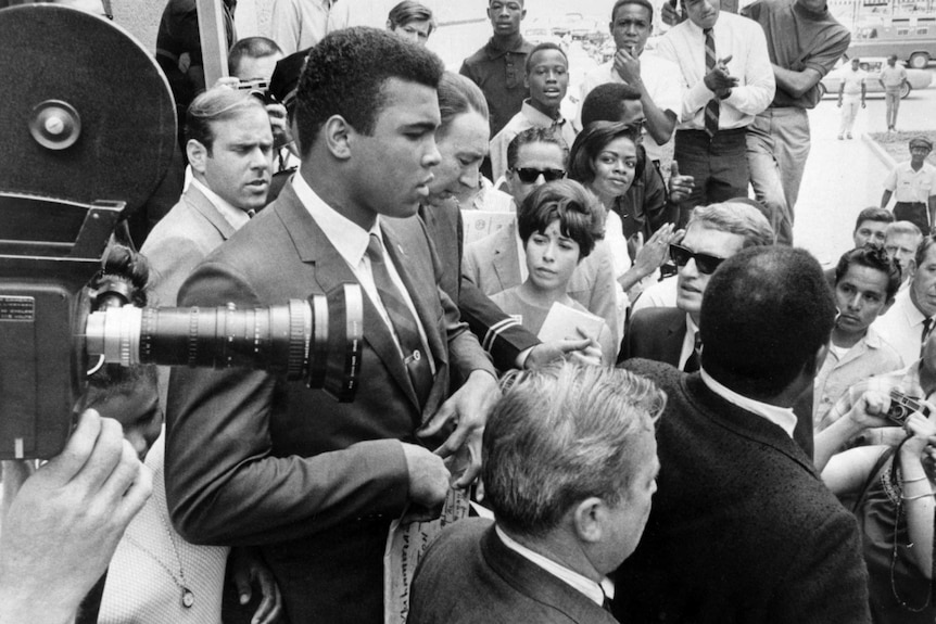 Muhammad Ali at press conference announcing his refusal to go to Vietnam