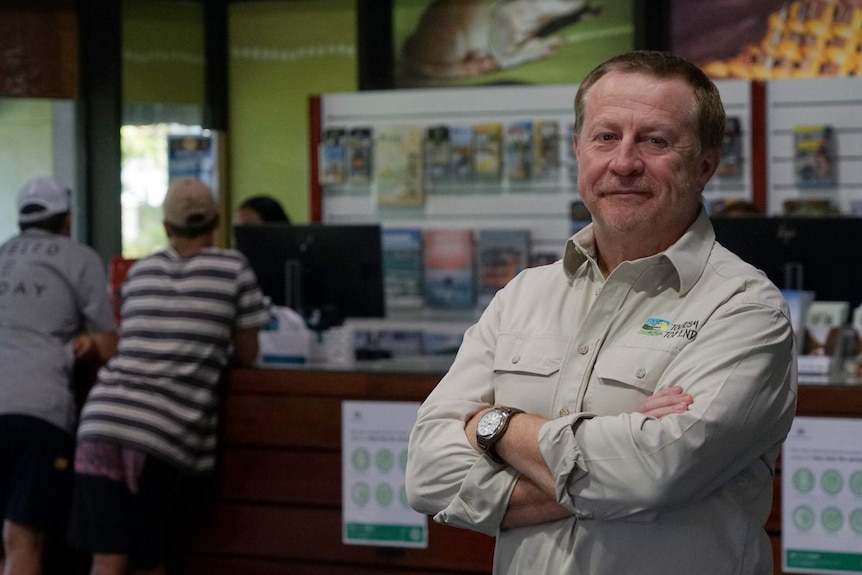 A photo of Tourism Top End general manager Glen Hingley folding his arms in the Tourism Top End office.