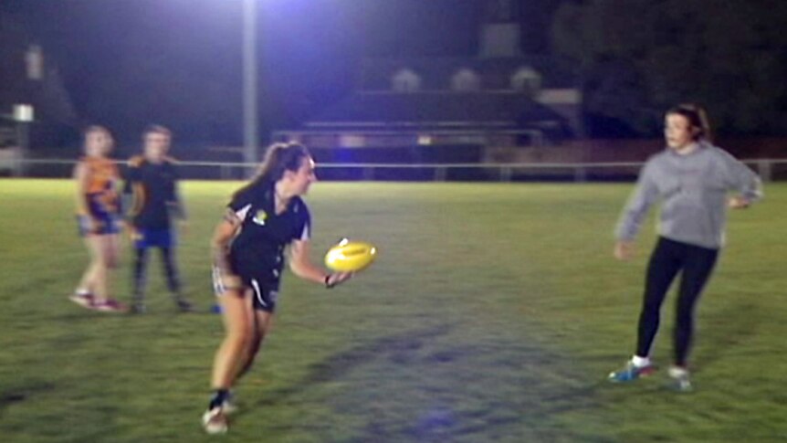 Players from the Evandale women's football team train.