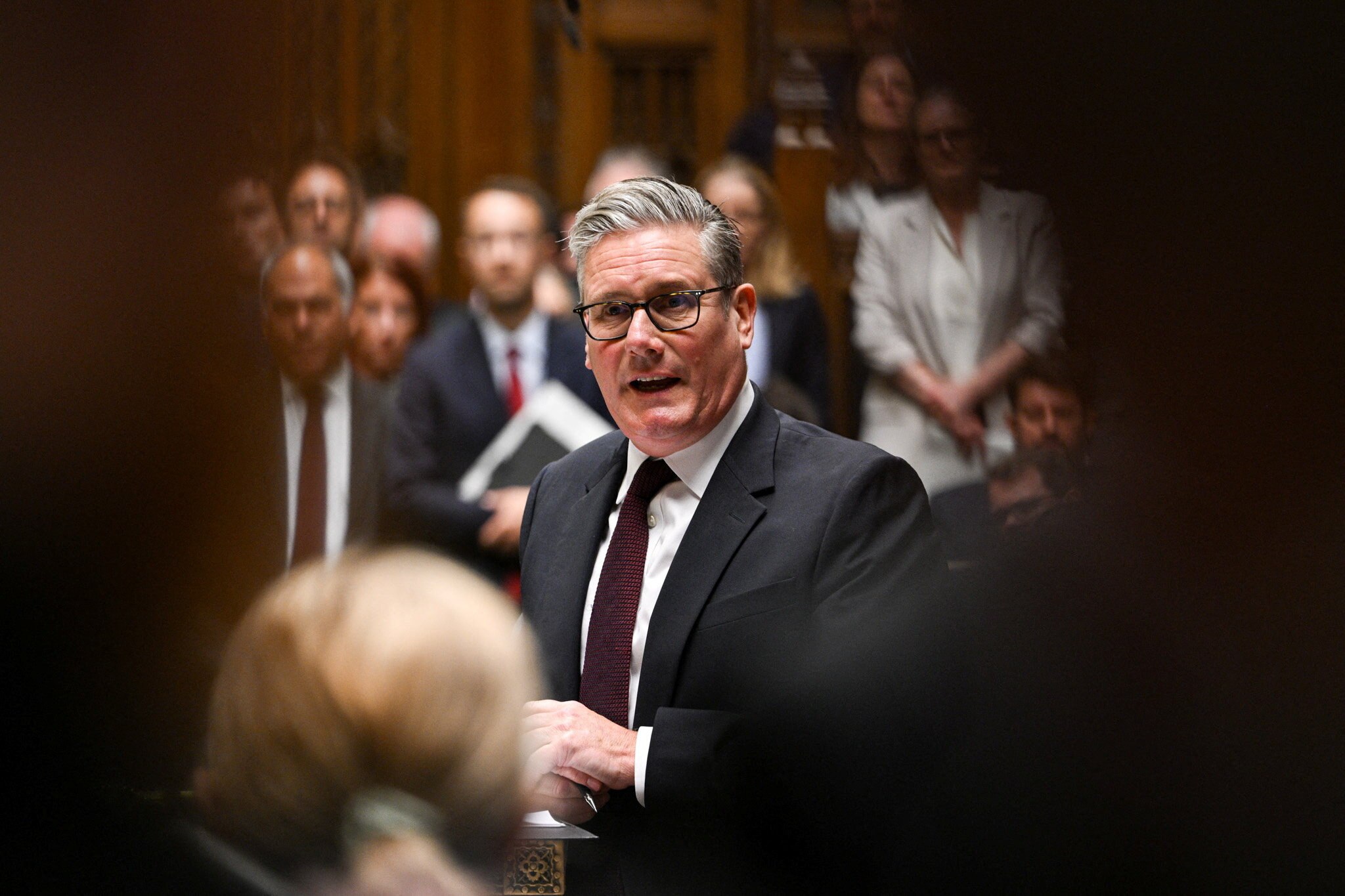 Keir Starmer standing on the floor of parliament.