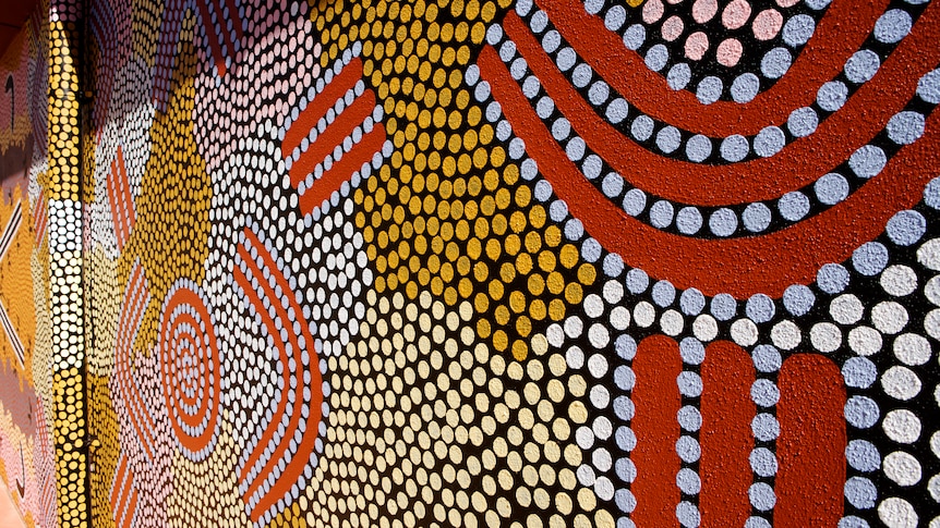 Dot painting on a wall in Alice Springs