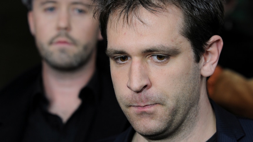 Tom Meagher speaks outside Melbourne court