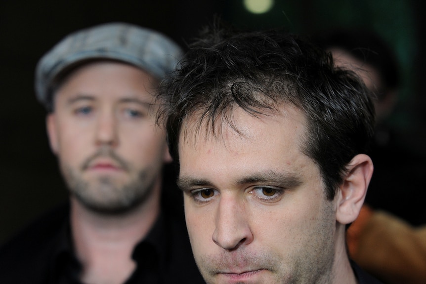 Tom Meagher speaks outside Melbourne court