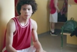 An advertisement calls on parents to speak to their children about gambling in sport.
