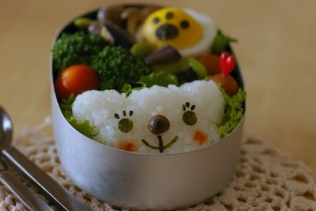 bear face made out of rice for a child's lunch