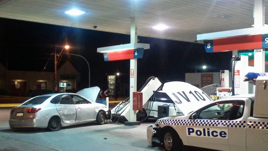 The pump and the police car were badly damaged after they were rammed
