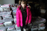 Safyre Terry with some of the thousands of Christmas cards she has received