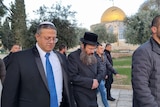 Itamar Ben-Gvir walks near the Dome of the Rock.
