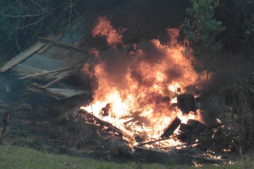 A shed in flames