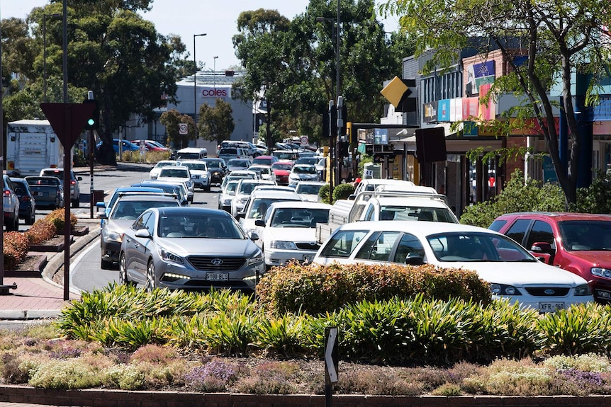 The road into Blackwood roundabout congested with cars.