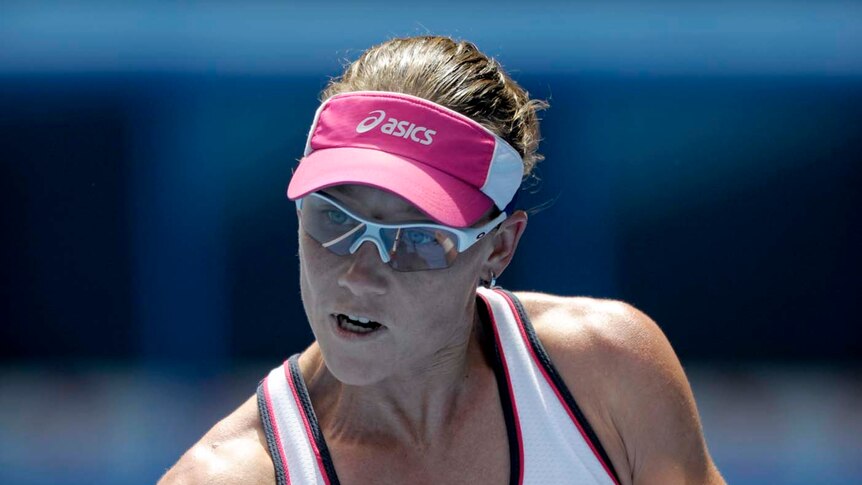 Samantha Stosur returns against Sorana Cirstea