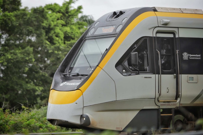 A close up of the front of an electric train