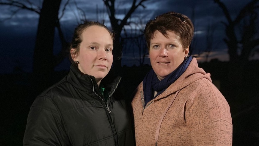 Hayley and Tracie Doohan stand at their property.