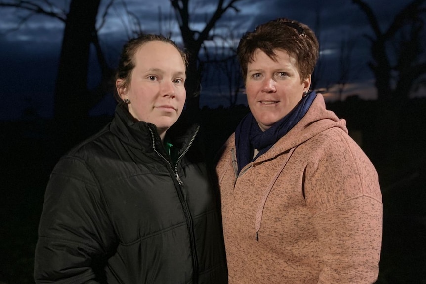 Hayley and Tracie Doohan stand at their property.