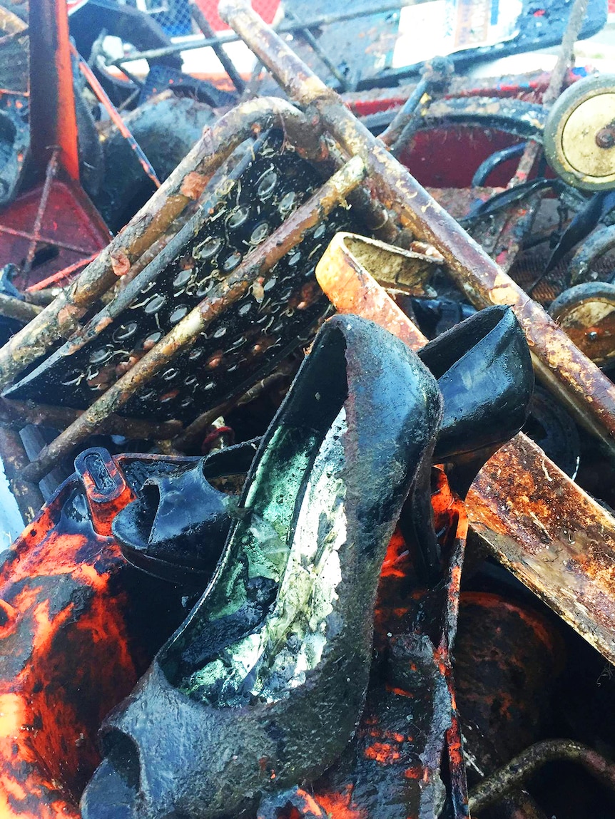 Women's shoes and other items retrieved from a river.