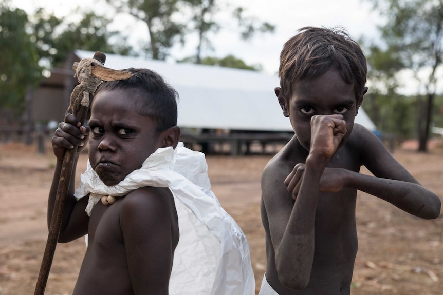 Local kids make faces at Kabulwarnamyo community in Arnhem Land.