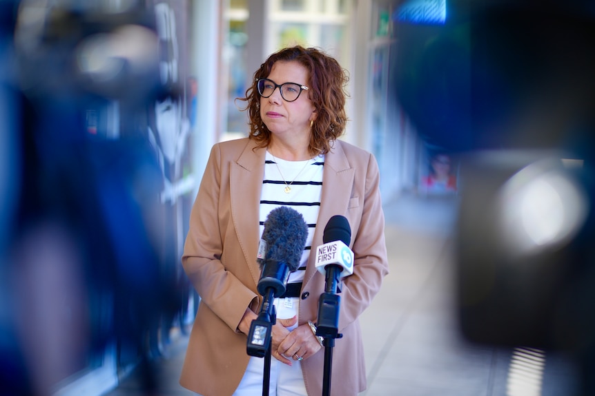 Amanda Rishworth takes questions from reporters at the Flagstaff Hill shopping centre in her southern Adelaide electorate