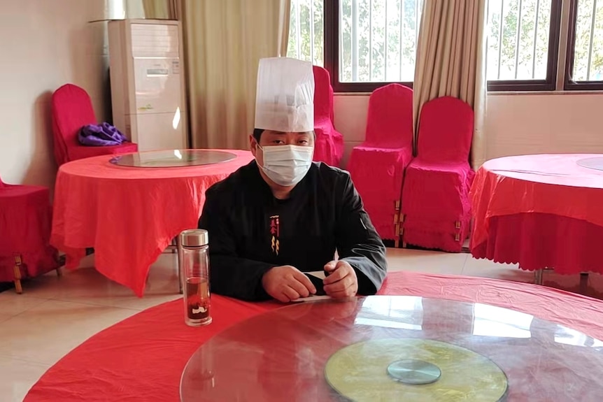 WANRU ZHANG IN HIS RESTAURANT