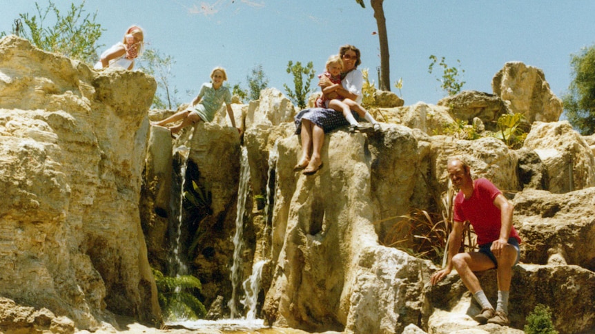 The Puik family on the limestone waterfall feature in 1980