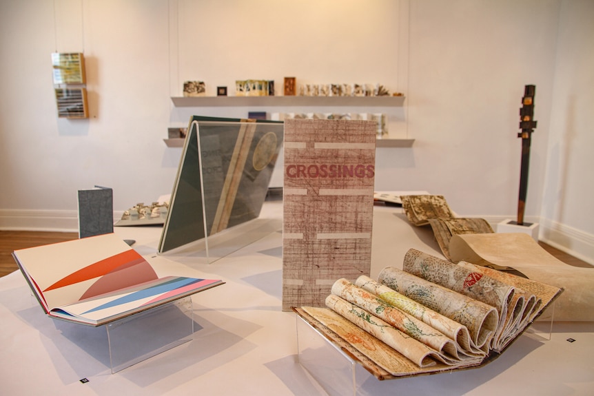 Hand made books are curated to display a fine assortment. 