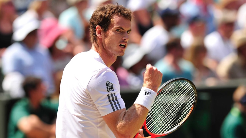 Britain's Andy Murray celebrates breaking the serve of Serbia's Novak Djokovic