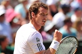 Britain's Andy Murray celebrates breaking the serve of Serbia's Novak Djokovic