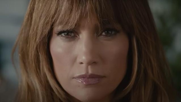 A close up of Jennifer Lopez's face looking determined.