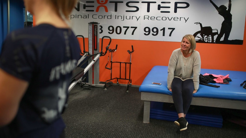 Jack Vawdrey's mum Julie watches on as he does spinal cord rehabilitation