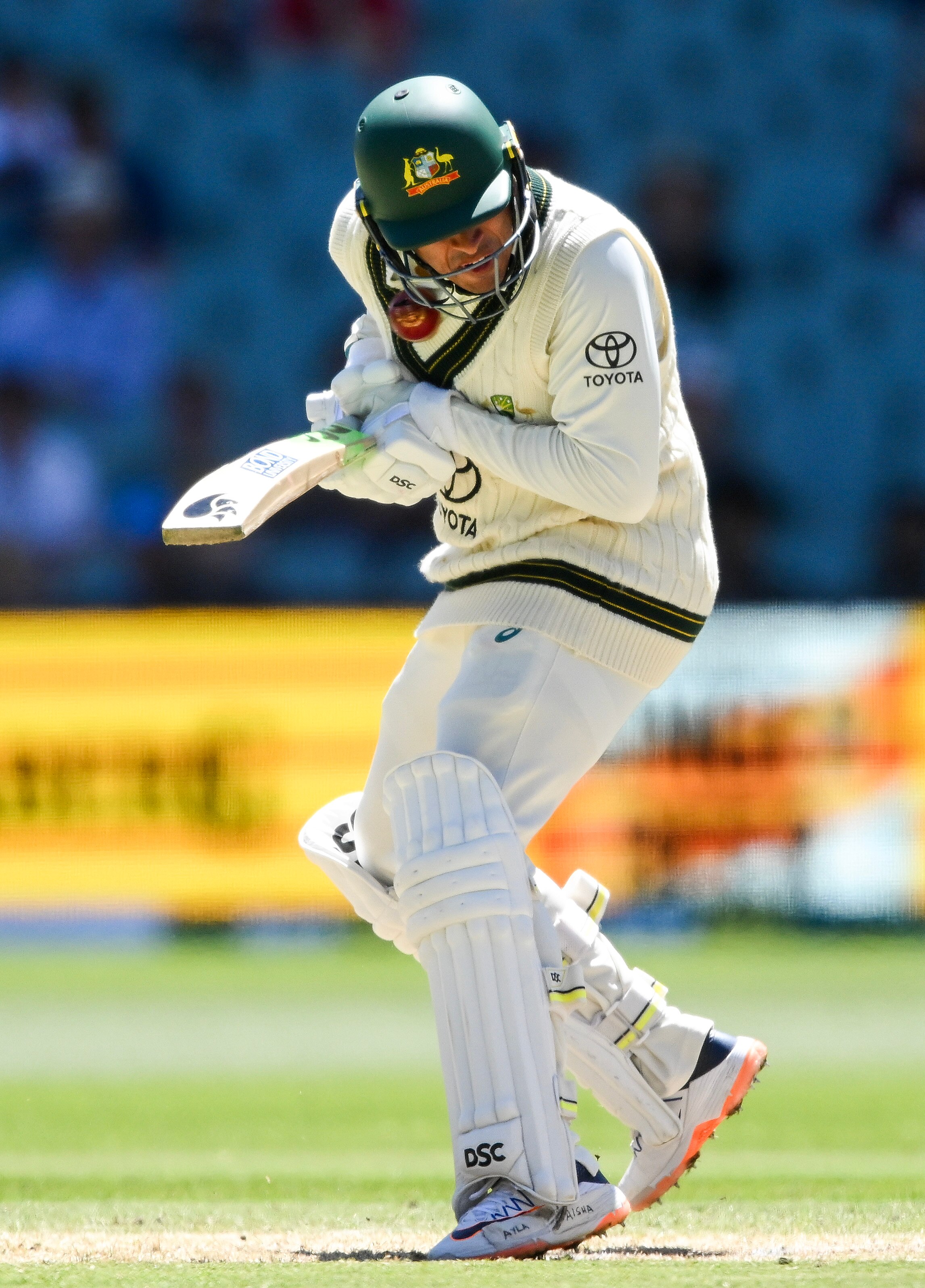 Usman Khawaja gets hit on the jaw