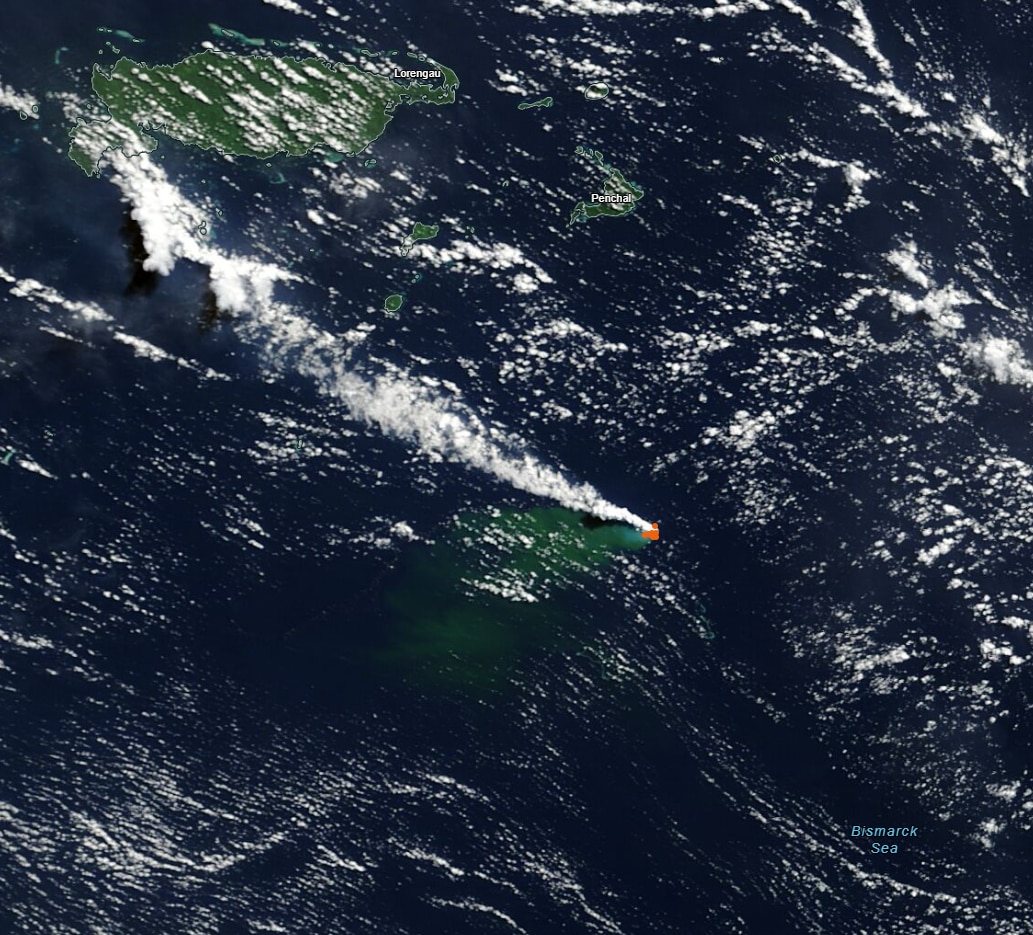 Ash clouds rise over the Bismarck Sea from undersea volcanic eruption