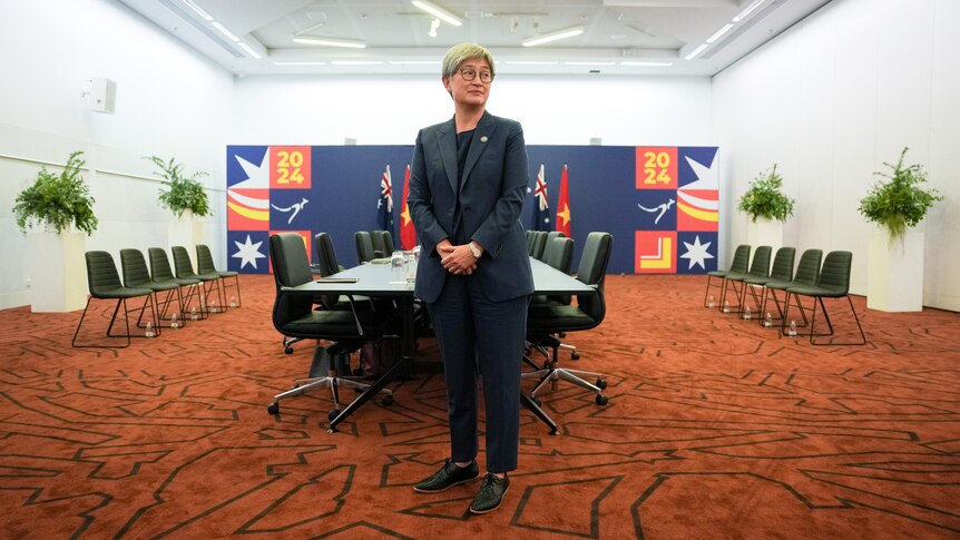 Penny Wong at the ASEAN Summit standing alone