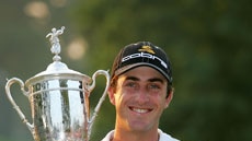 Geoff Ogilvy poses for photographers after winning the US Open.