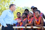 Tony Abbott with Clontarf foundation players in Kununurra