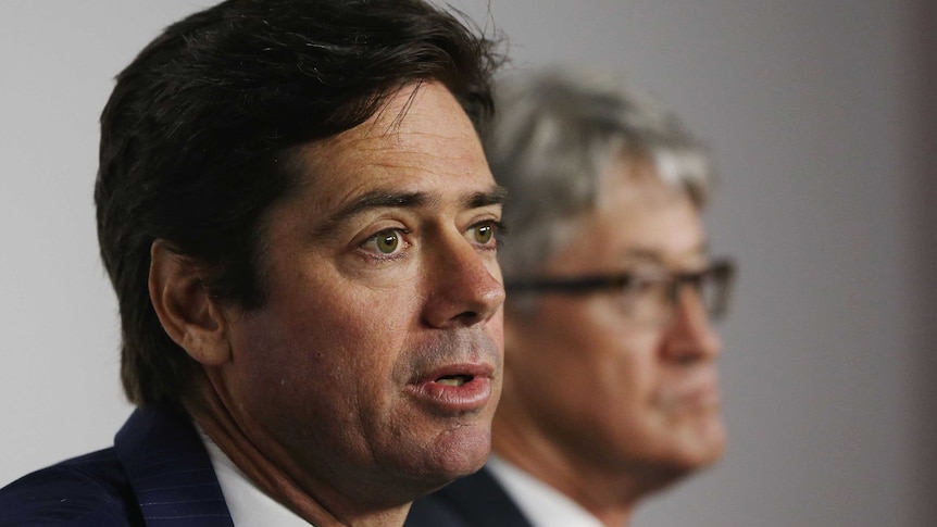 AFL Commission Chairman Mike Fitzpatrick and AFL chief Gillon McLachlan (L) speak to the media.